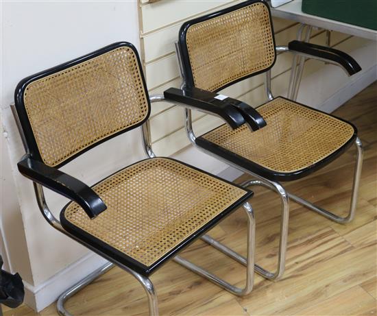 A set of six cane and chrome dining chairs